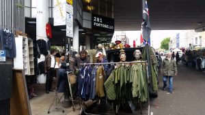 Military fashion and antiques stalls at Sunday Flea Market, Portobello Green Market. Visit