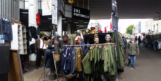 Military fashion and antiques stalls at Sunday Flea Market, Portobello Green Market. Visit