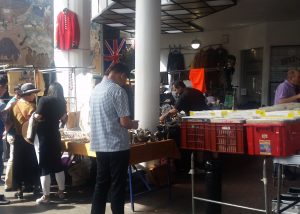 See the stalls at the Sunday Flea Market at Portobello Green