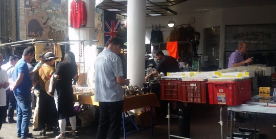See the stalls at the Sunday Flea Market at Portobello Green
